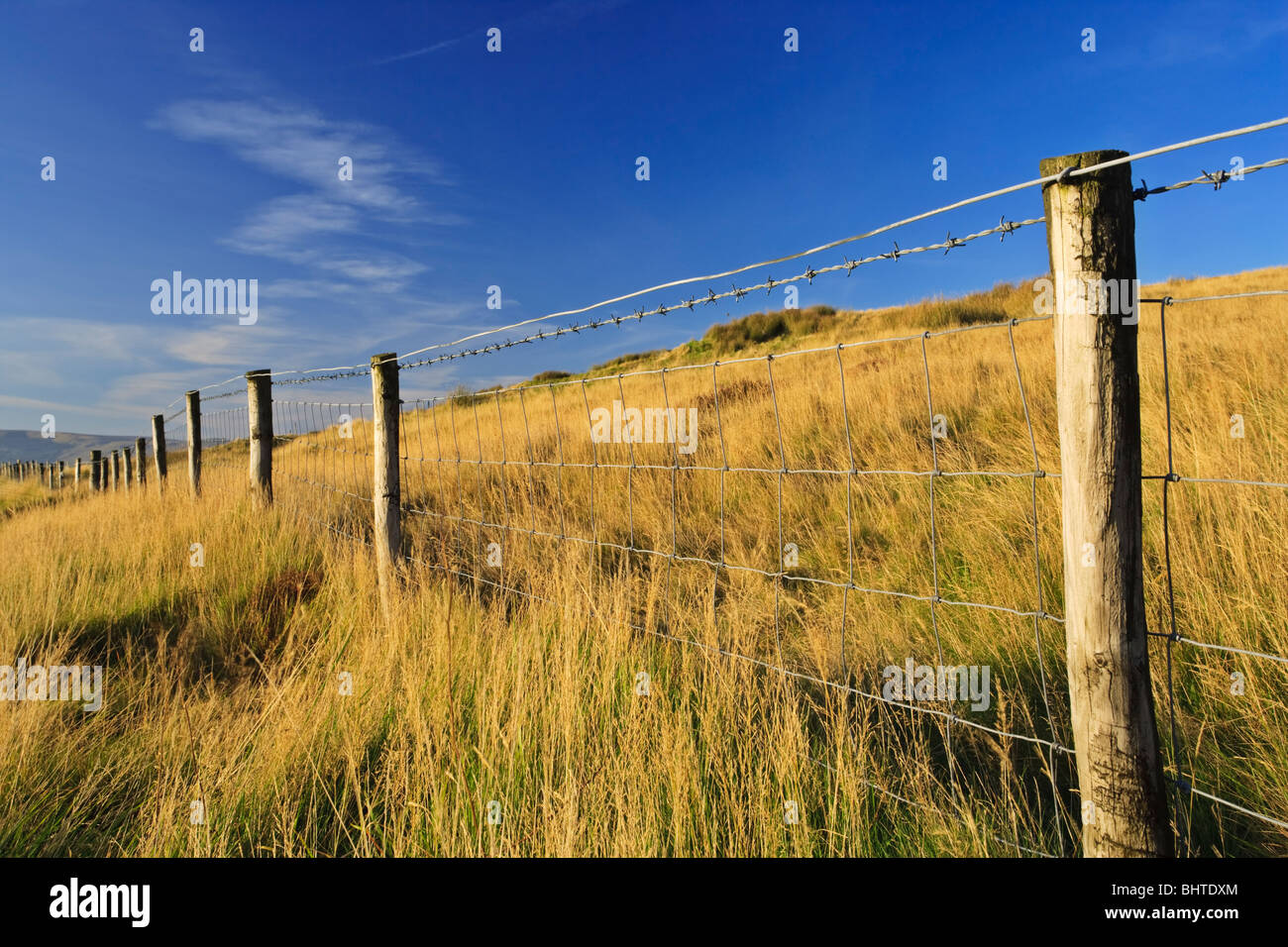 Fence running across moorland in the north Sperrins near the village of Feeny, County Londonderry, Northern Ireland Stock Photo