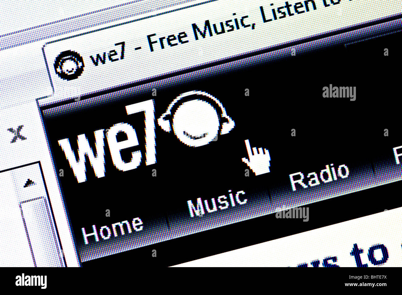 Macro screenshot of the we7 website - we7 is a free and legal online music streaming service. Editorial use only. Stock Photo