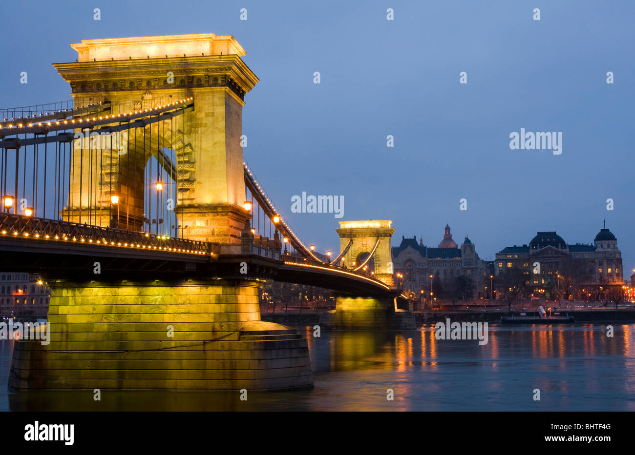 The chain Bridge, Budapest, Hungary, at night, with lights reflected in the water. Stock Photo