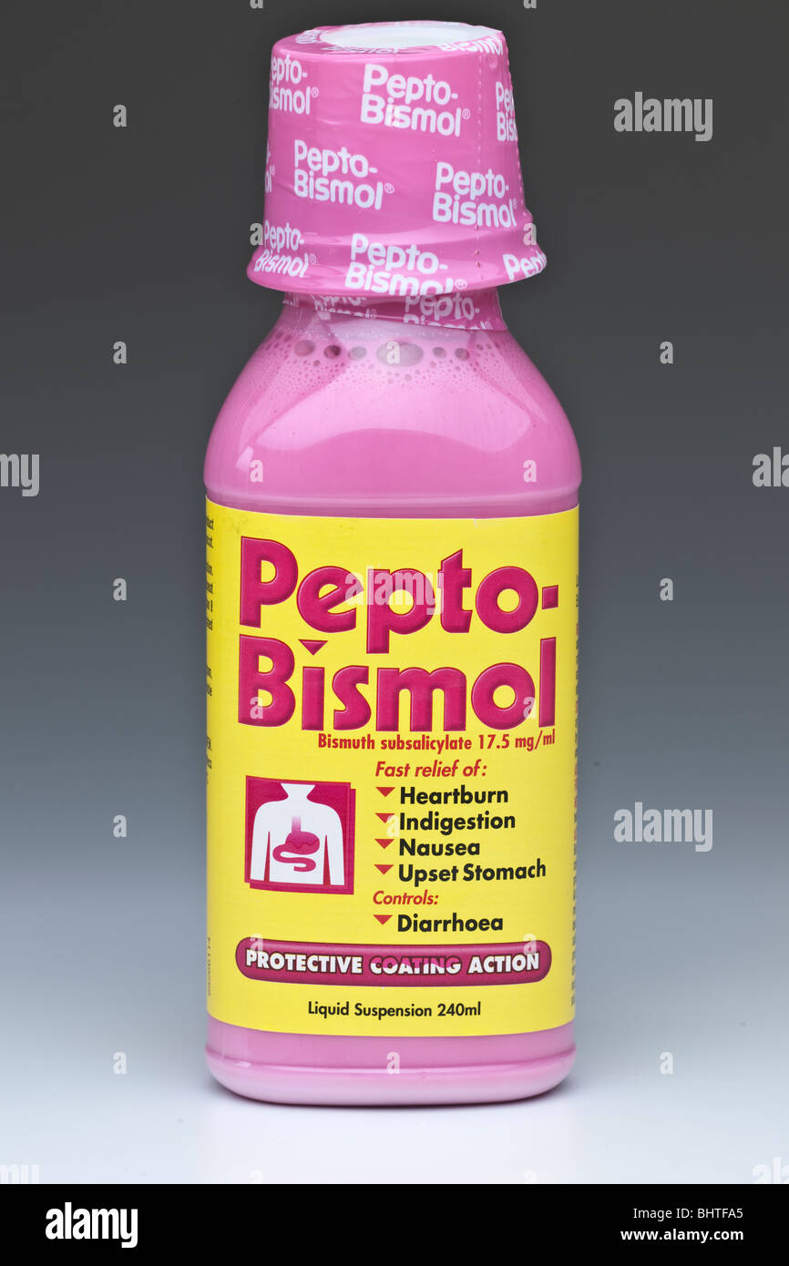Plastic bottle of pink Pepto Bismol indigestion remedy liquid Stock
