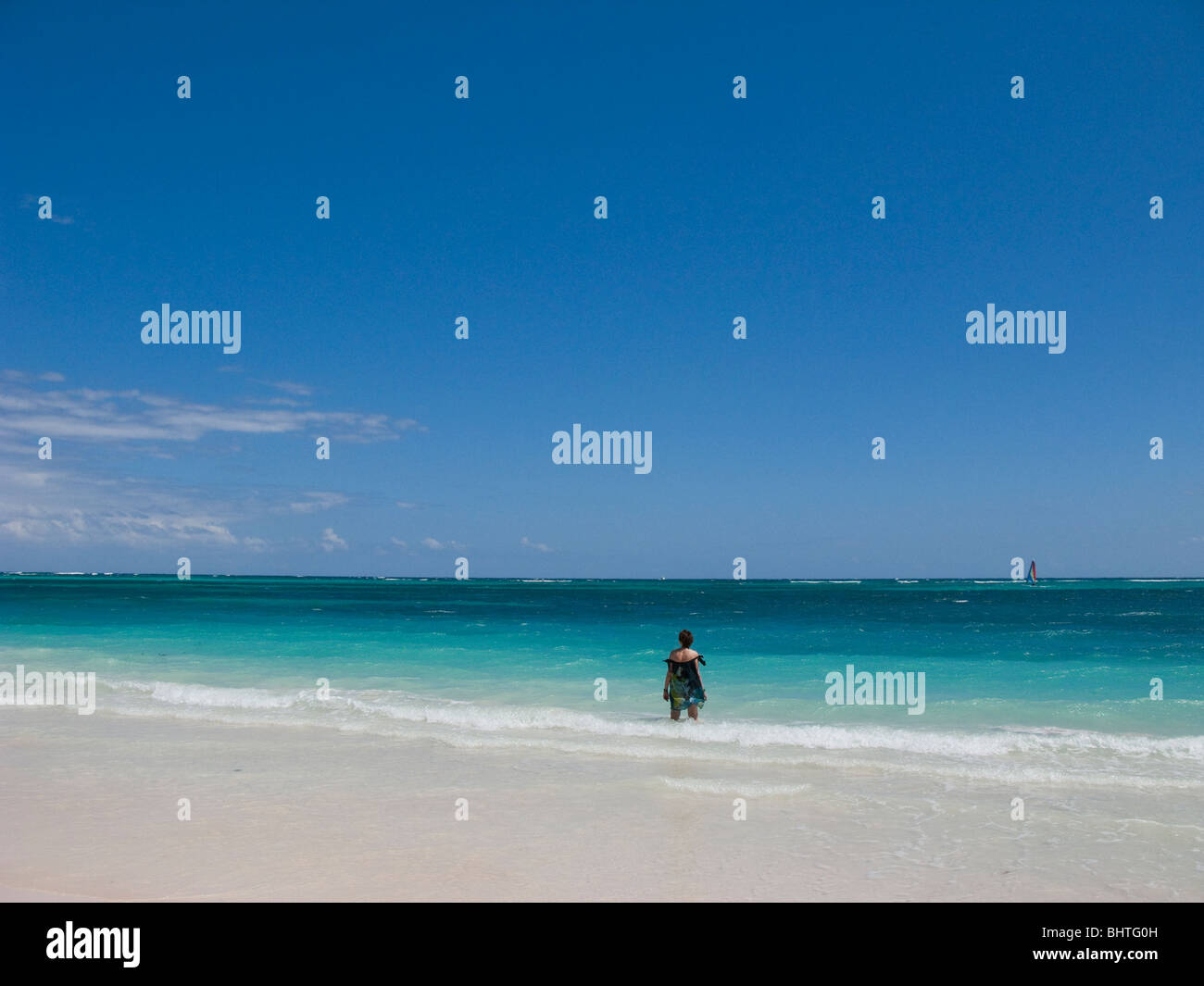 Woman watching waves hi-res stock photography and images - Alamy