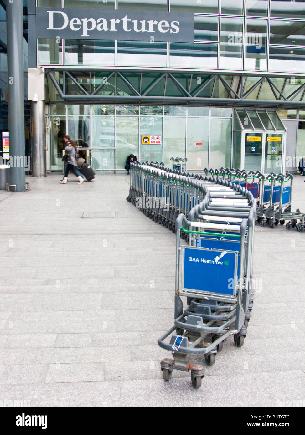 Trolleys at Departure, Heathrow Airport, London, UK Stock Photo
