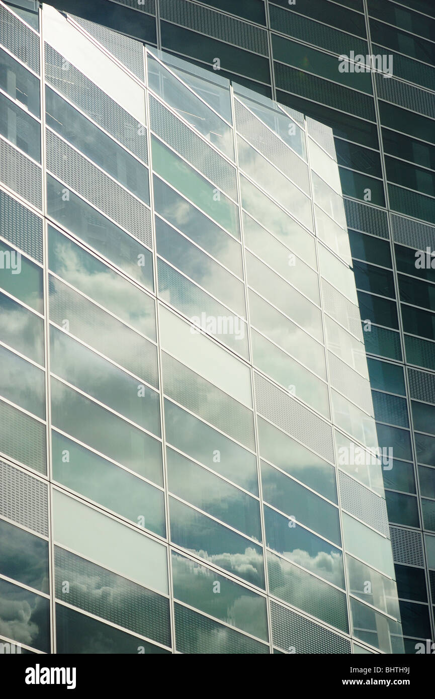 Reflections of clouds in office windows Stock Photo