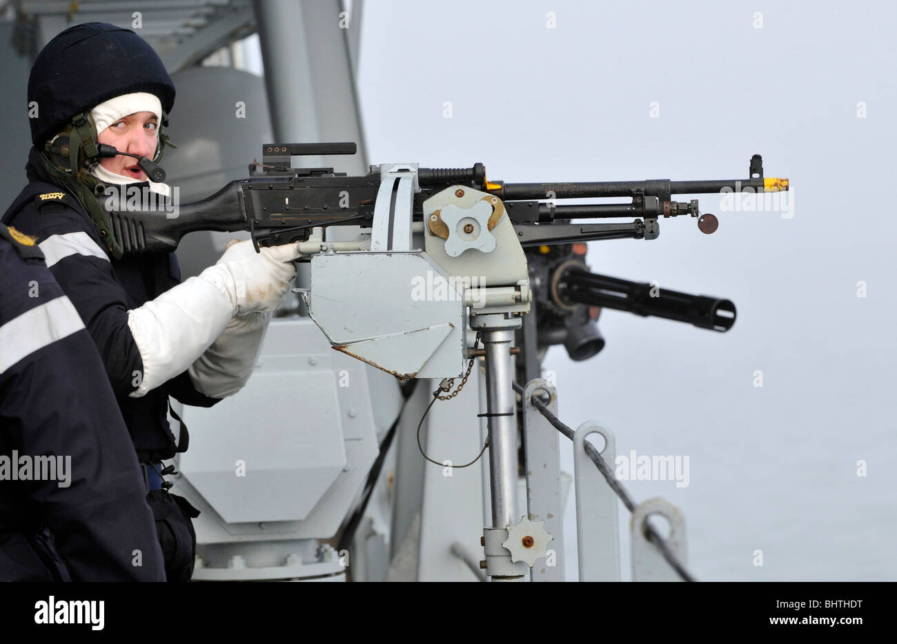 “Royal Navy' general purpose machine gunner on HMS Albion, UK Stock Photo