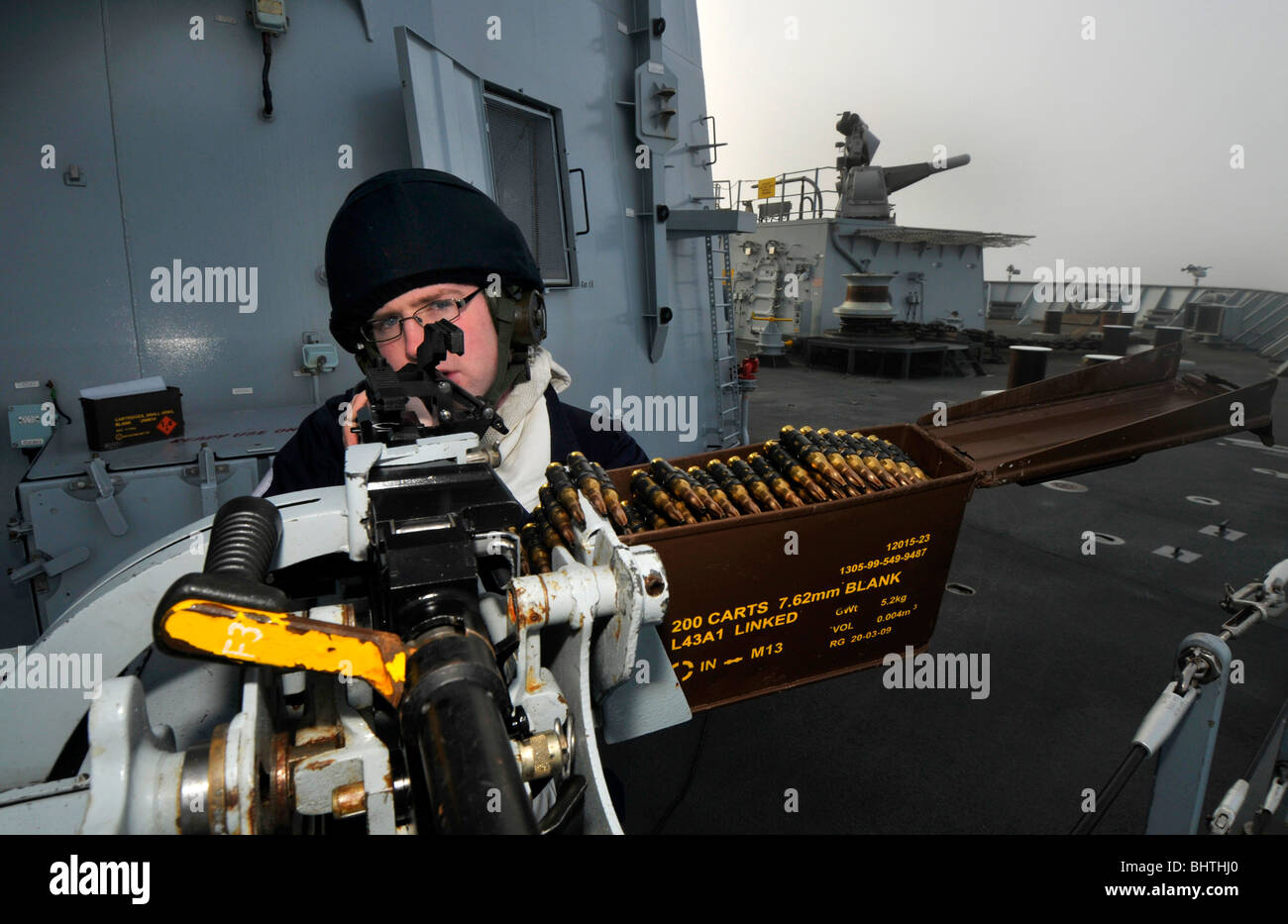 “Royal Navy' general purpose machine gunner on HMS Albion, UK Stock Photo