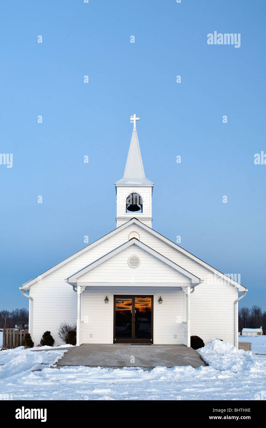 Sunset Reflected in Glass Doors of Little White Church in Crawford County, Indiana Stock Photo
