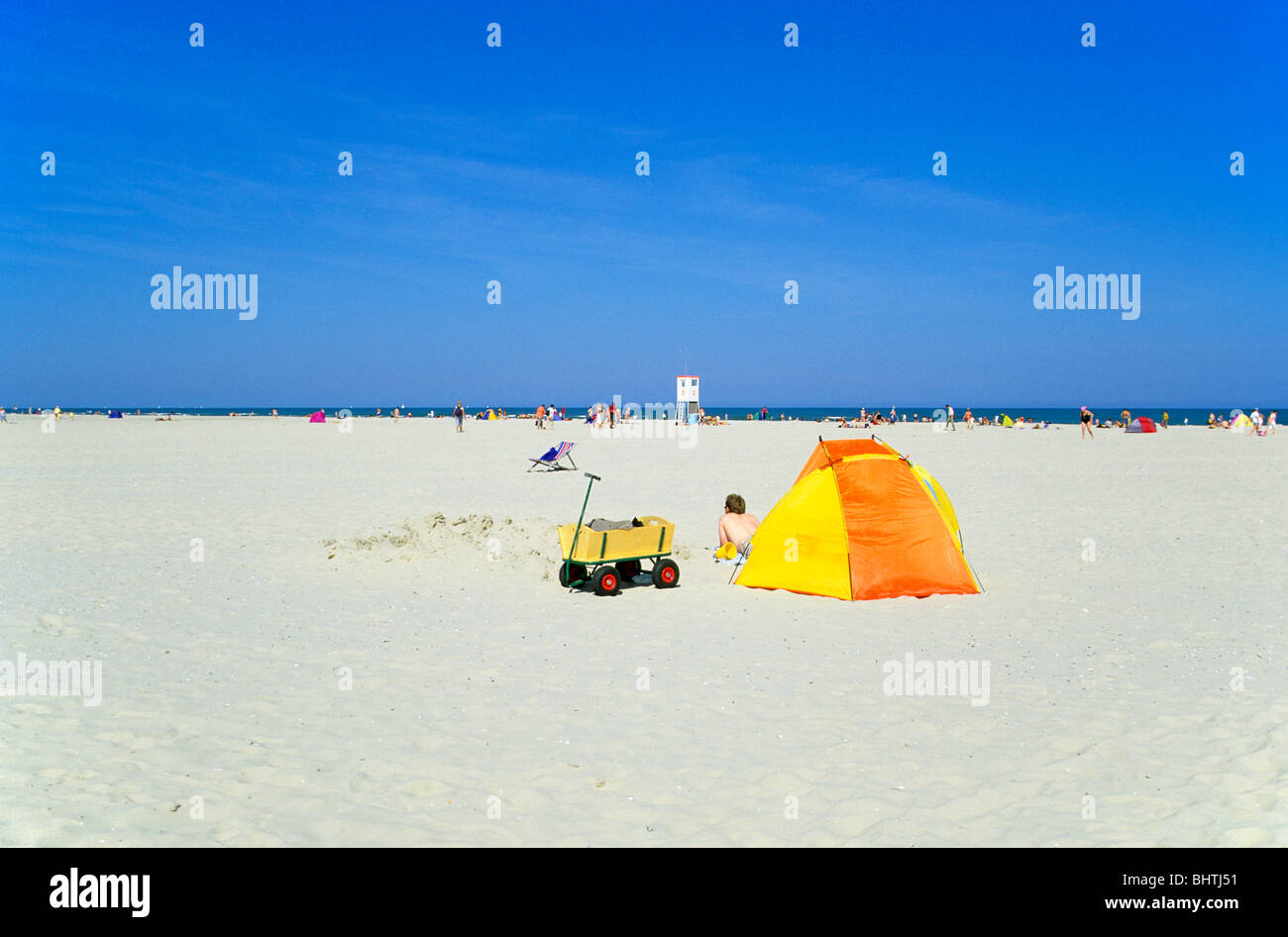 beach cabana and hand trolley at the beach of Juist Island, East Friesland, Lower Saxony, Germany Stock Photo