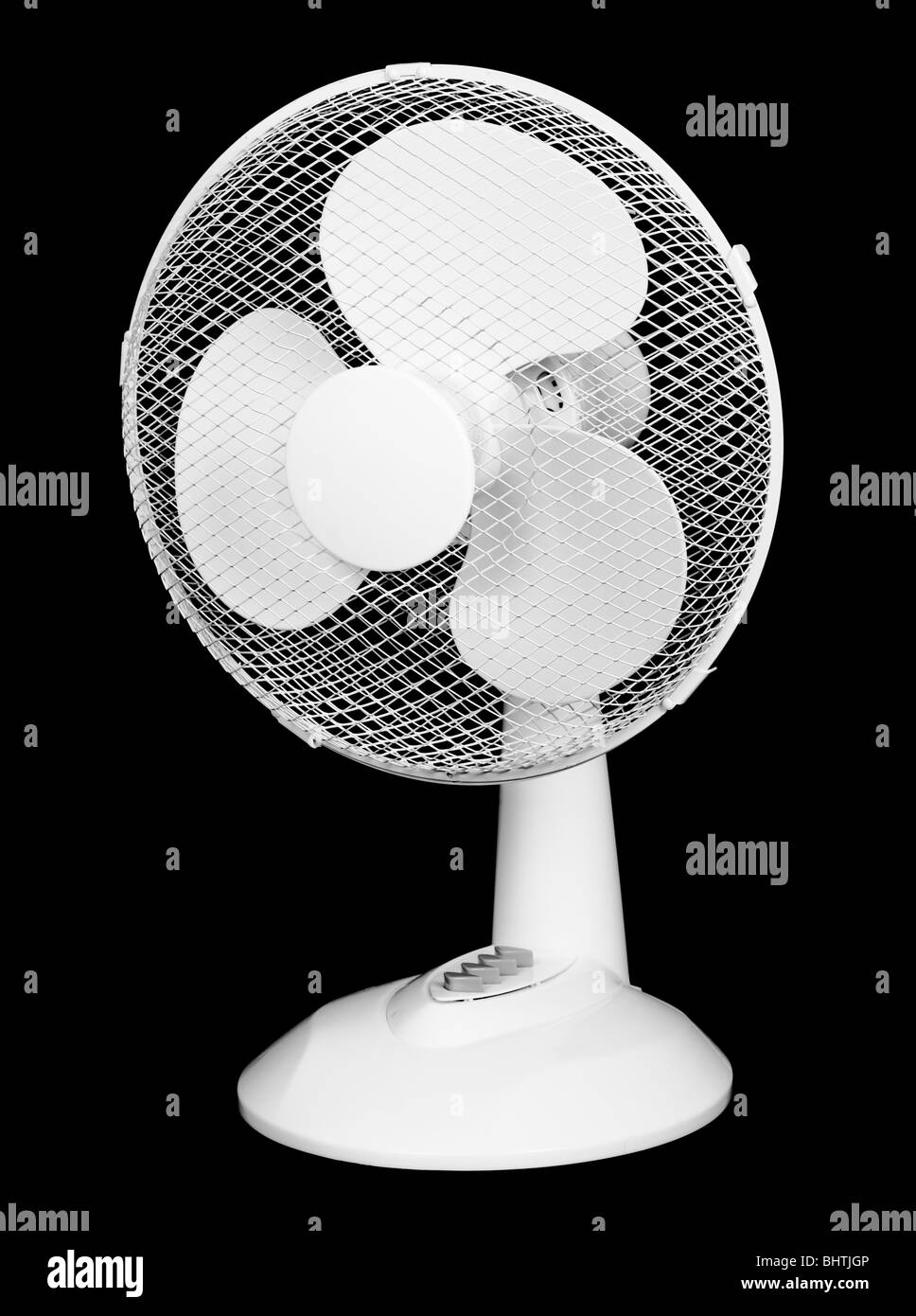 Table plastic electric fan isolated on black background Stock Photo