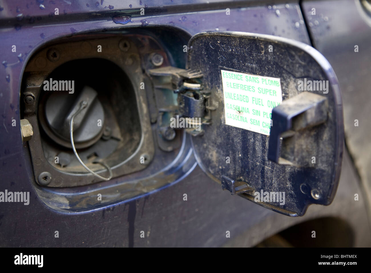 Unleaded petrol fuel cap Stock Photo