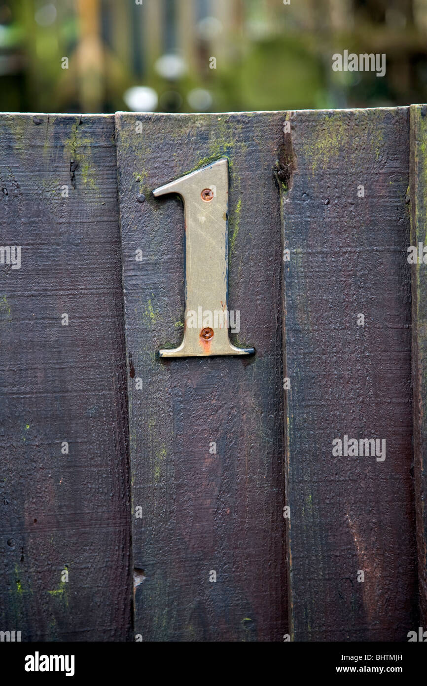 Number One figure on wooden gate Stock Photo