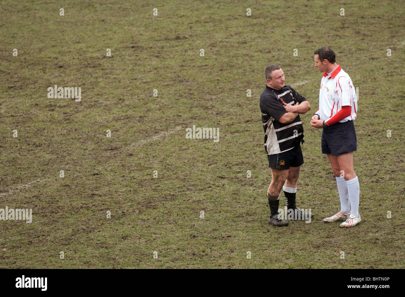 rugby referee reprimanding a  broughton park player Stock Photo