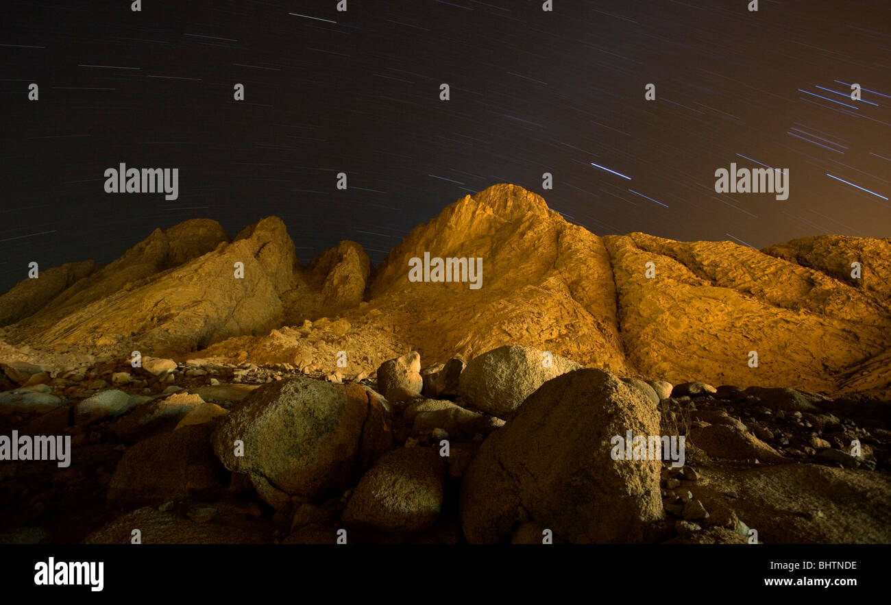 Star trails over the summit of Mount Sinai at night, Saint Katherine, Egypt. Stock Photo