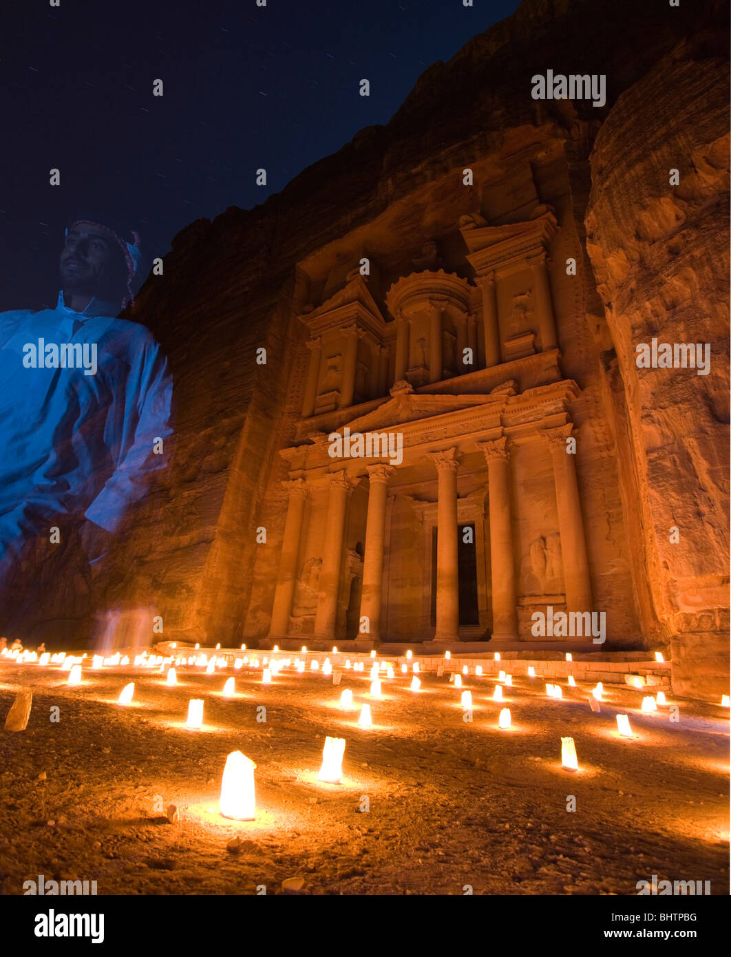 The Treasury or Al Khaznah lit up by candles for Petra by night in Wady Musa, Jordan. Stock Photo