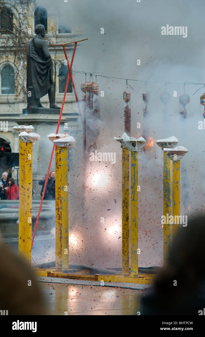 Chinese fireworks and firecrackers on display at a Chinese New Year event in Trafalgar Square London UK Stock Photo