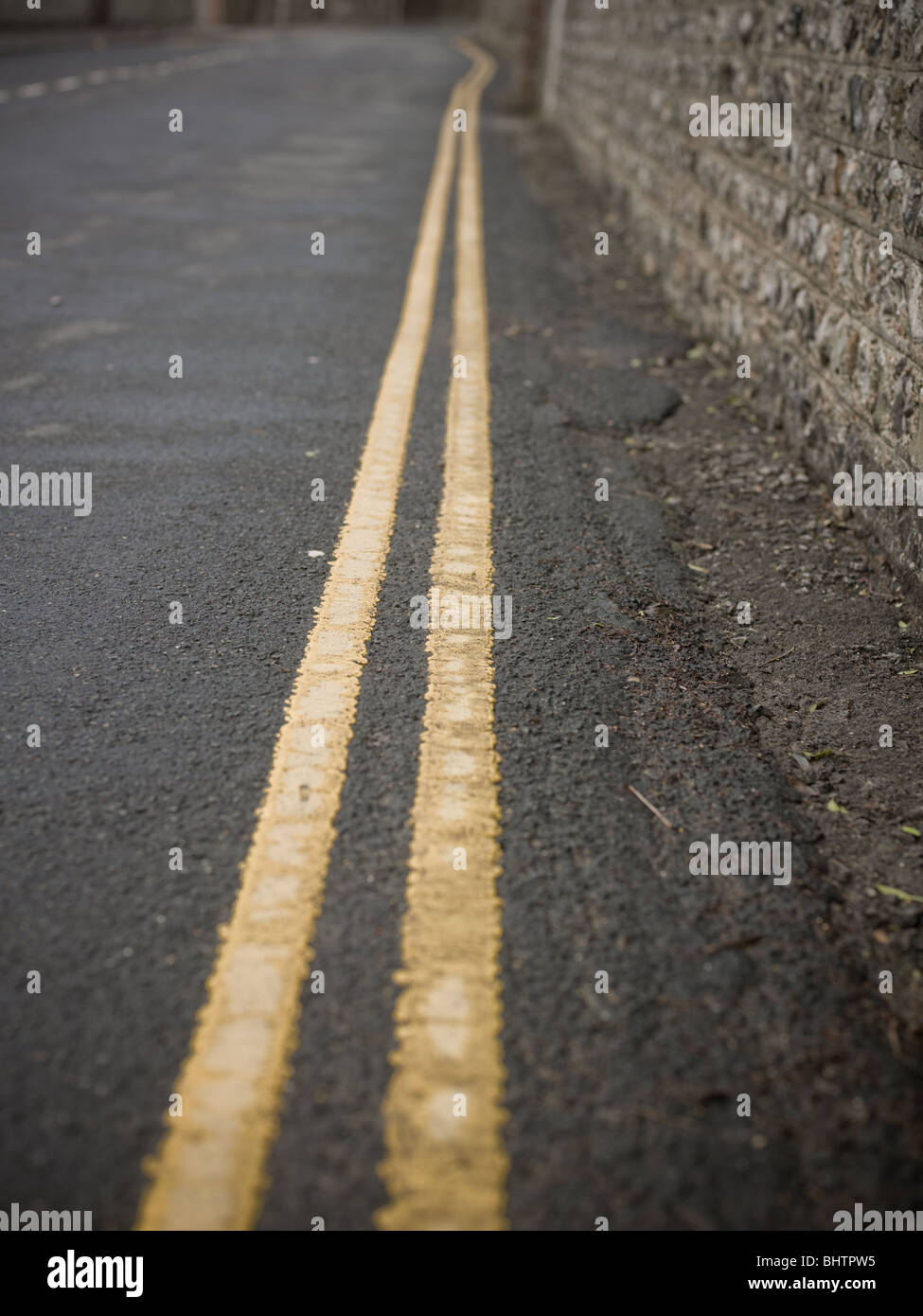 Double yellow lines on road Stock Photo Alamy