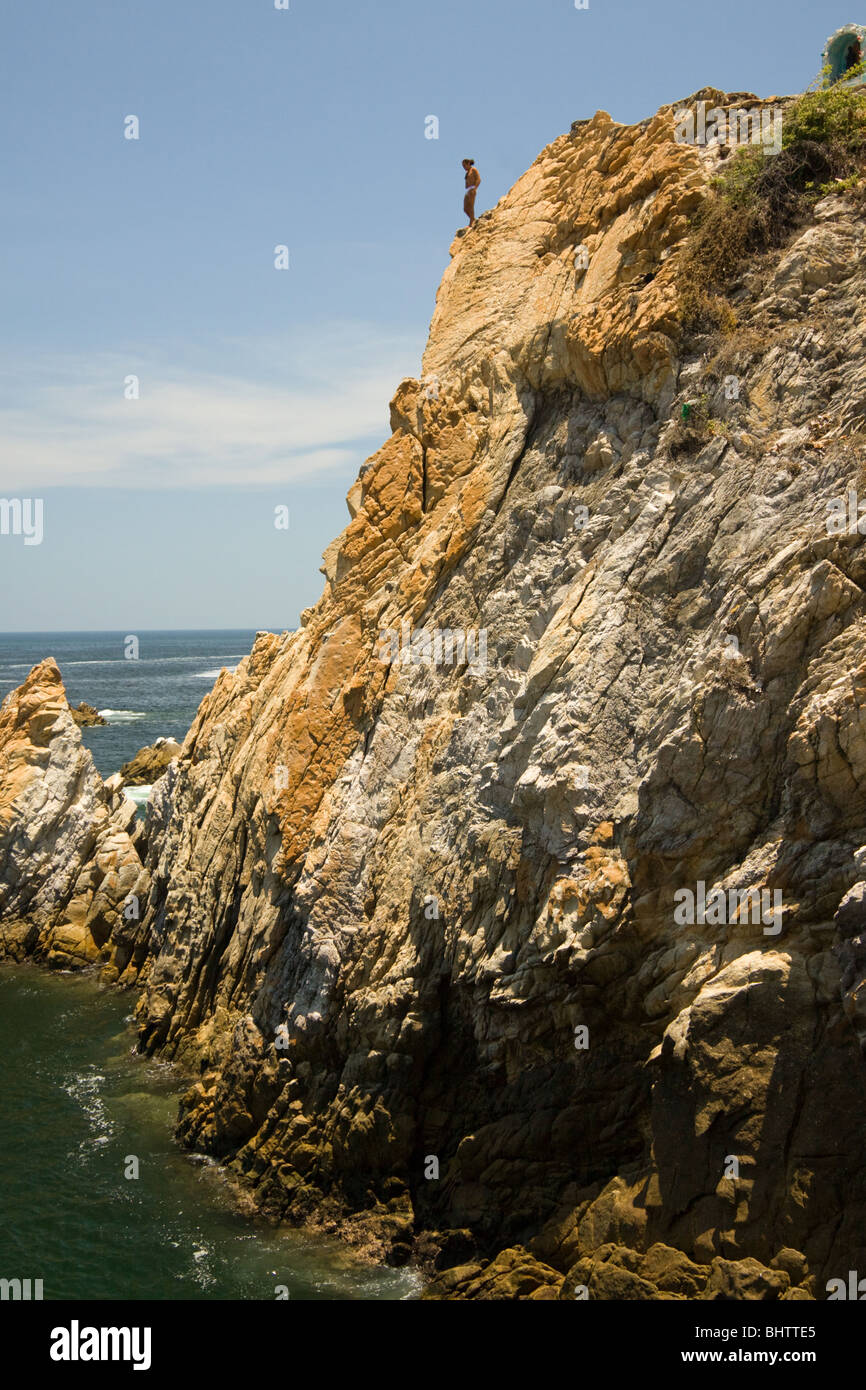 Cliff diver ready to jump, La Quebrada, Acapulco, Mexico Stock Photo