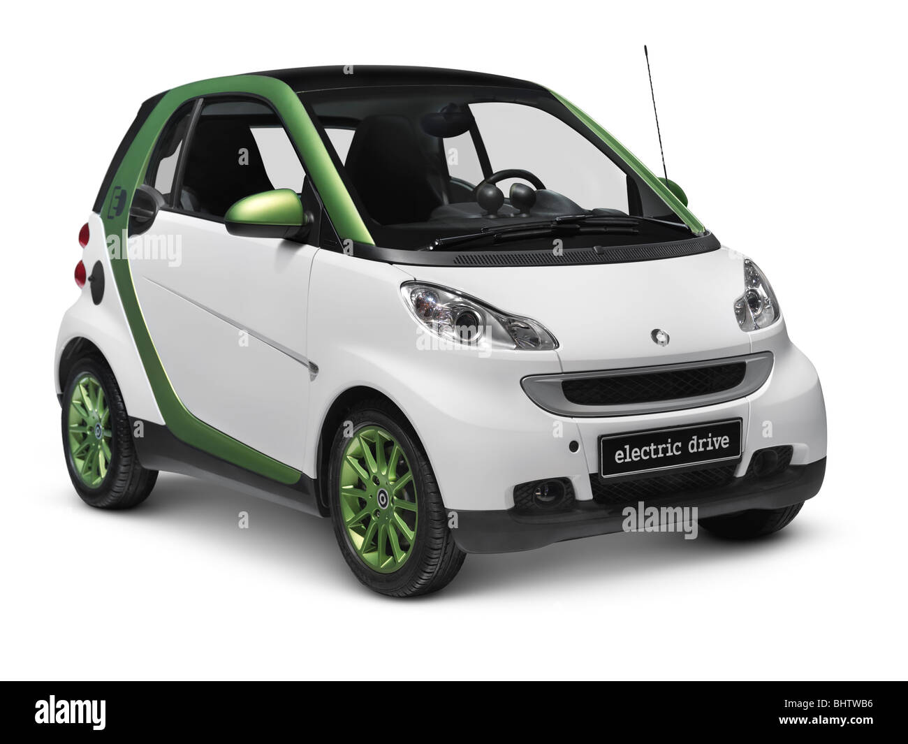 License available at MaximImages.com - Smart Fortwo Electric Drive - eSmart - Smart ED battery powered city car. Isolated on white background with cli Stock Photo