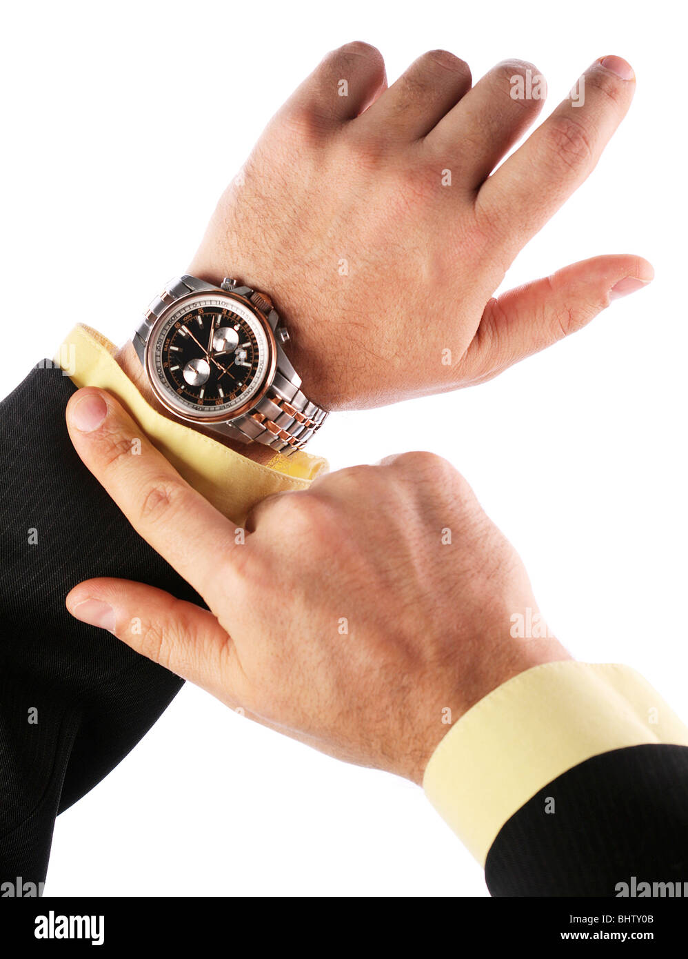 Businessman looks at his watch Stock Photo