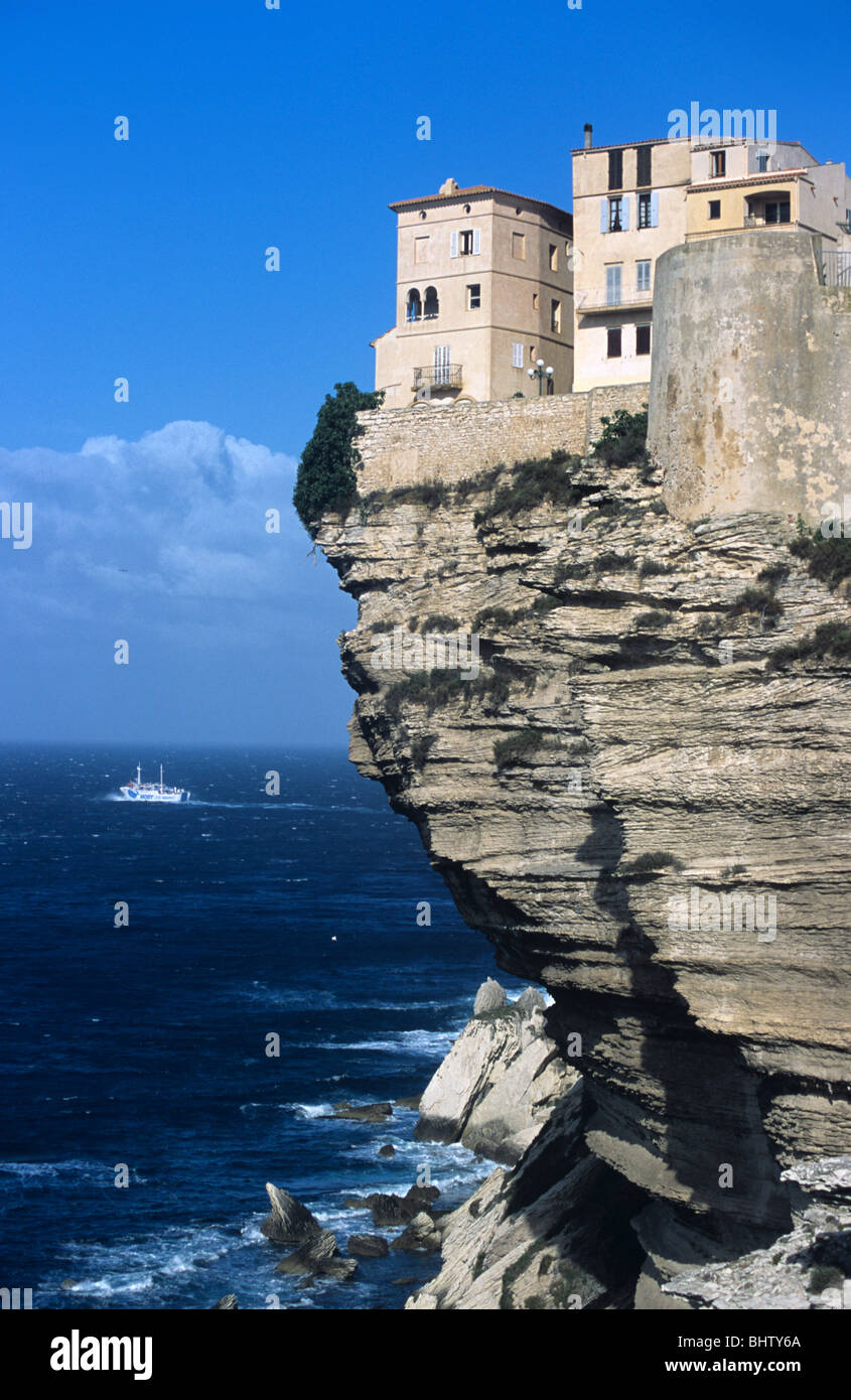 Clifftop Houses Perched on Limestone Cliffs, & Mediterranean Sea, Bonifacio, Corsica, France Stock Photo