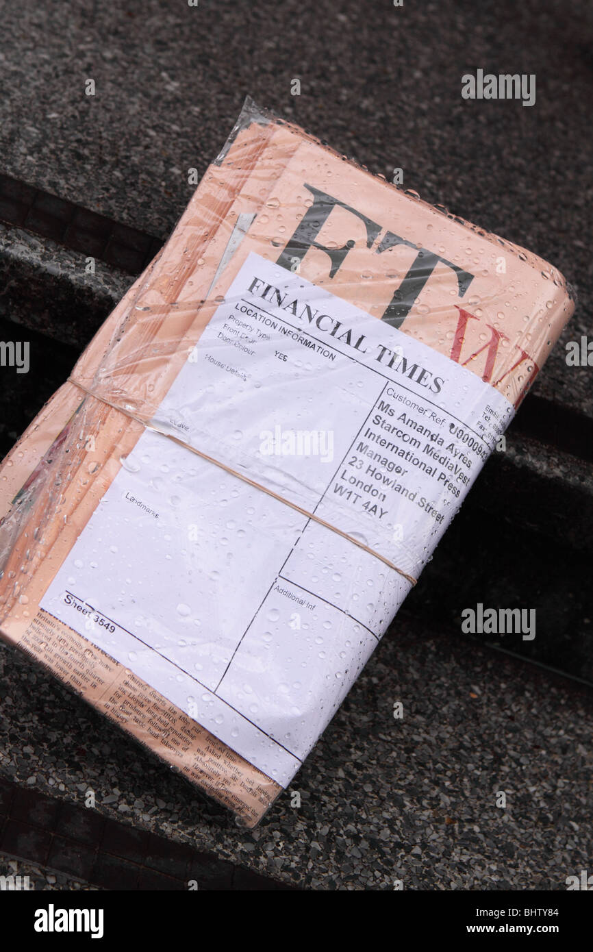 The Financial Times newspaper subscription delivery copy on office steps in London UK Stock Photo