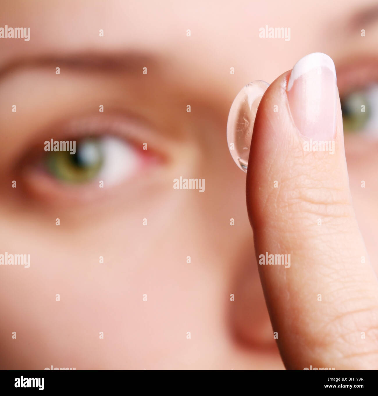 human eye with corrective lens on a white Stock Photo