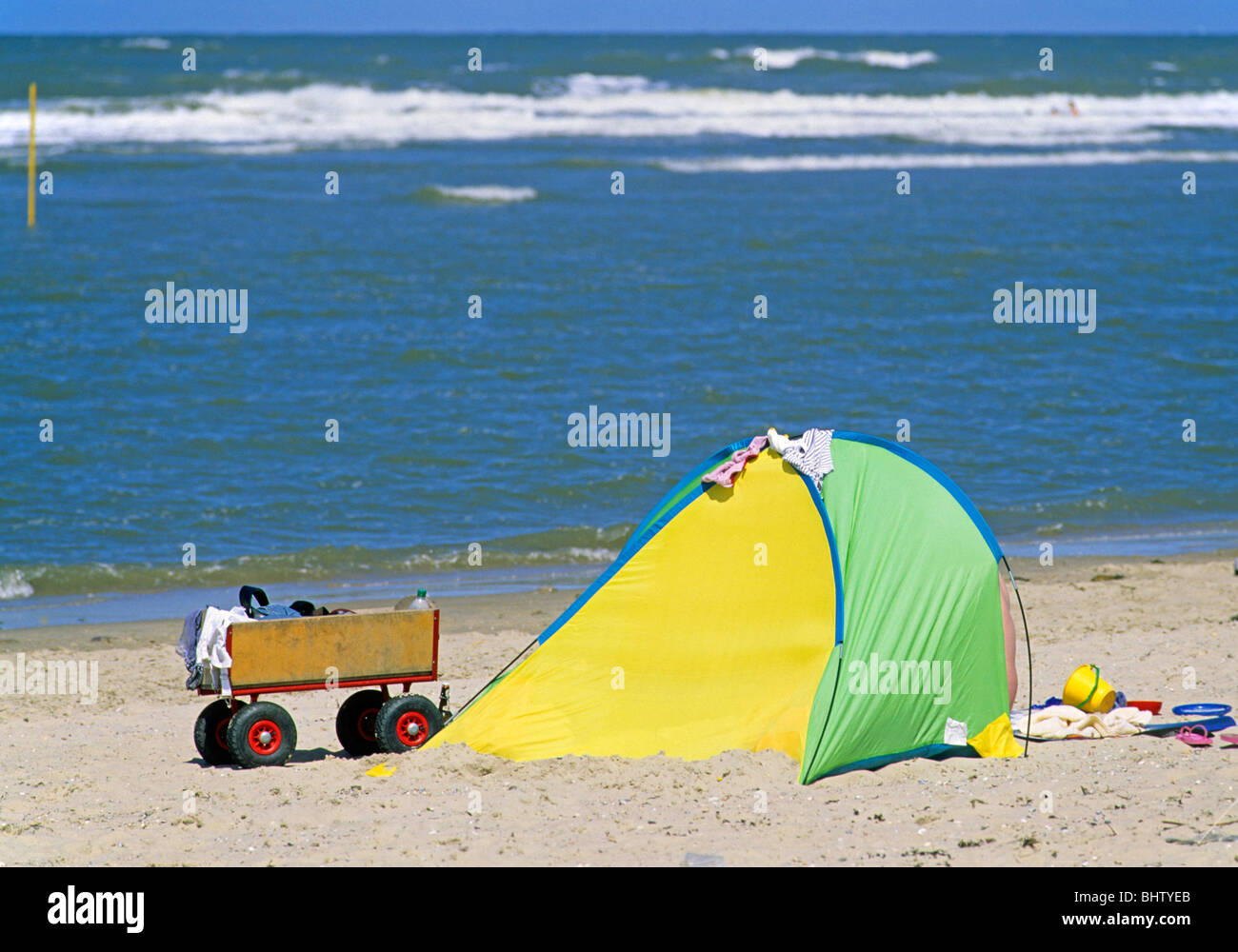 trolley and beach cabana at the beach of Spiekeroog Island, East Friesland, Lower Saxony, Germany Stock Photo
