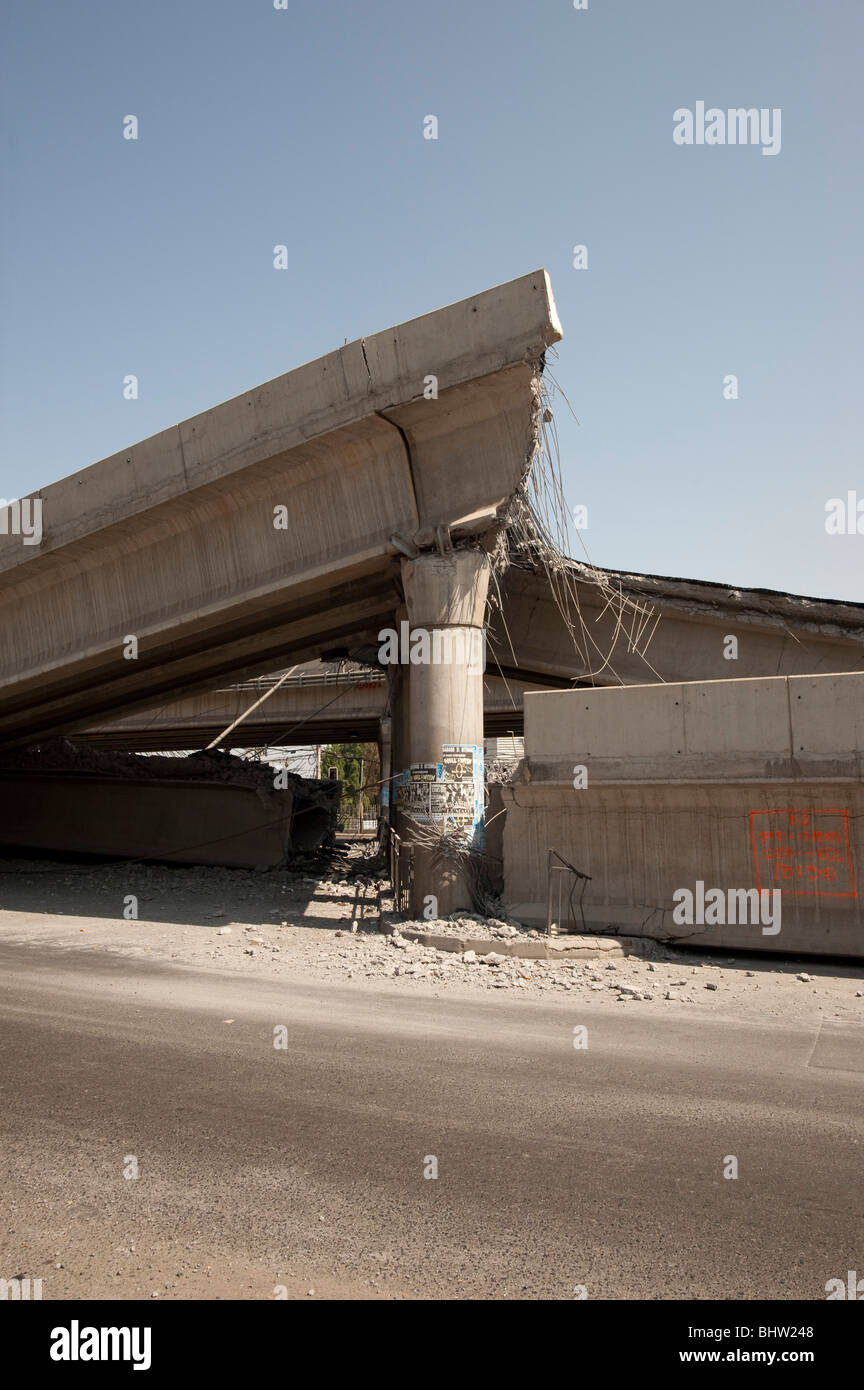 Collapsed Higway, Americo Vespucio Norte. With cars who fell in to the empty. Stock Photo