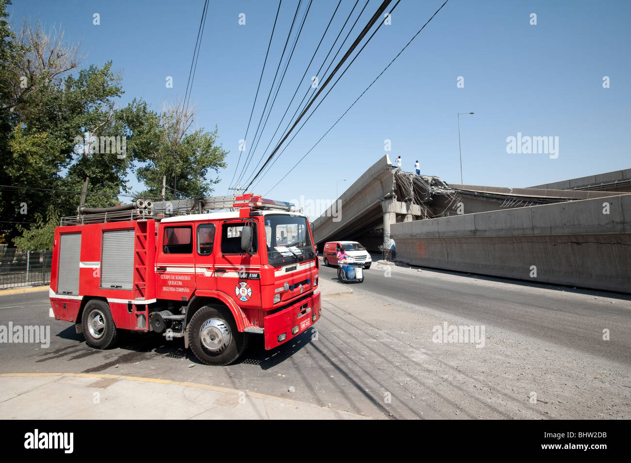 A Firemen Truck by the ruins of the collapsed Highway, Americo Vespucio Norte. Stock Photo