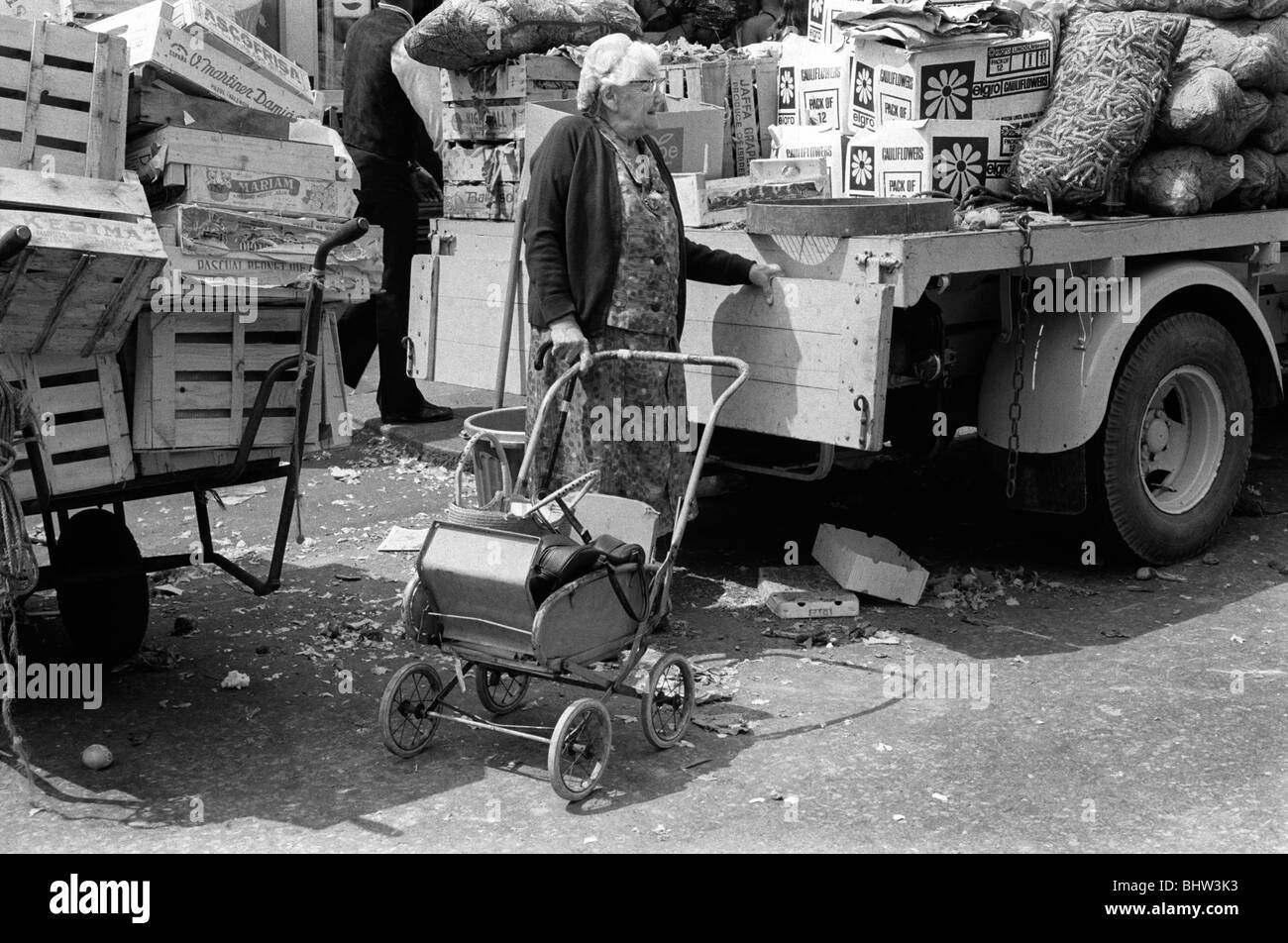 Senior pensioner going shopping Notting Hill west London UK 1975  HOMER SYKES Stock Photo