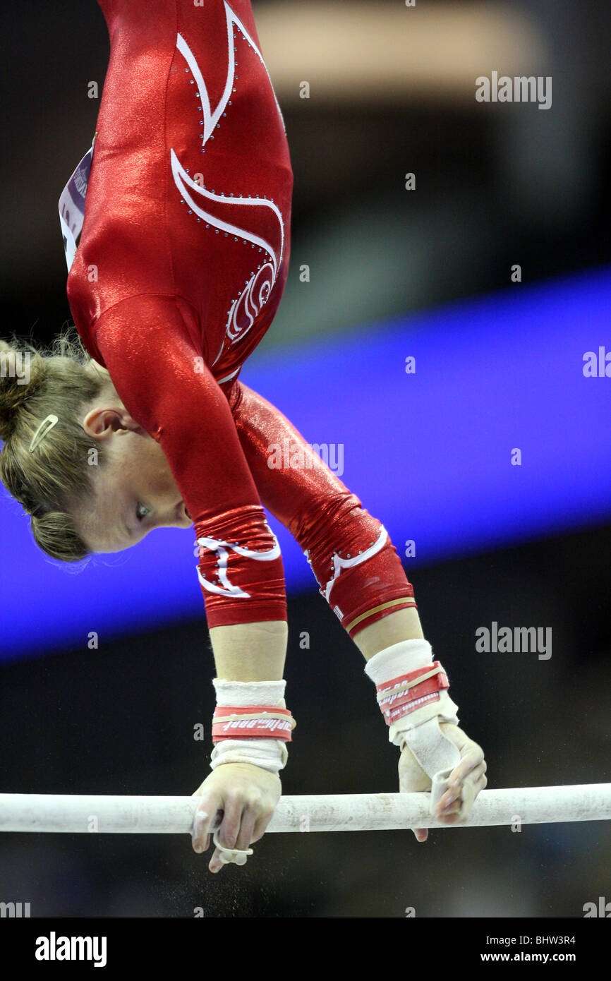 Bridget Sloan American top allround female gymnast performs on bars at
