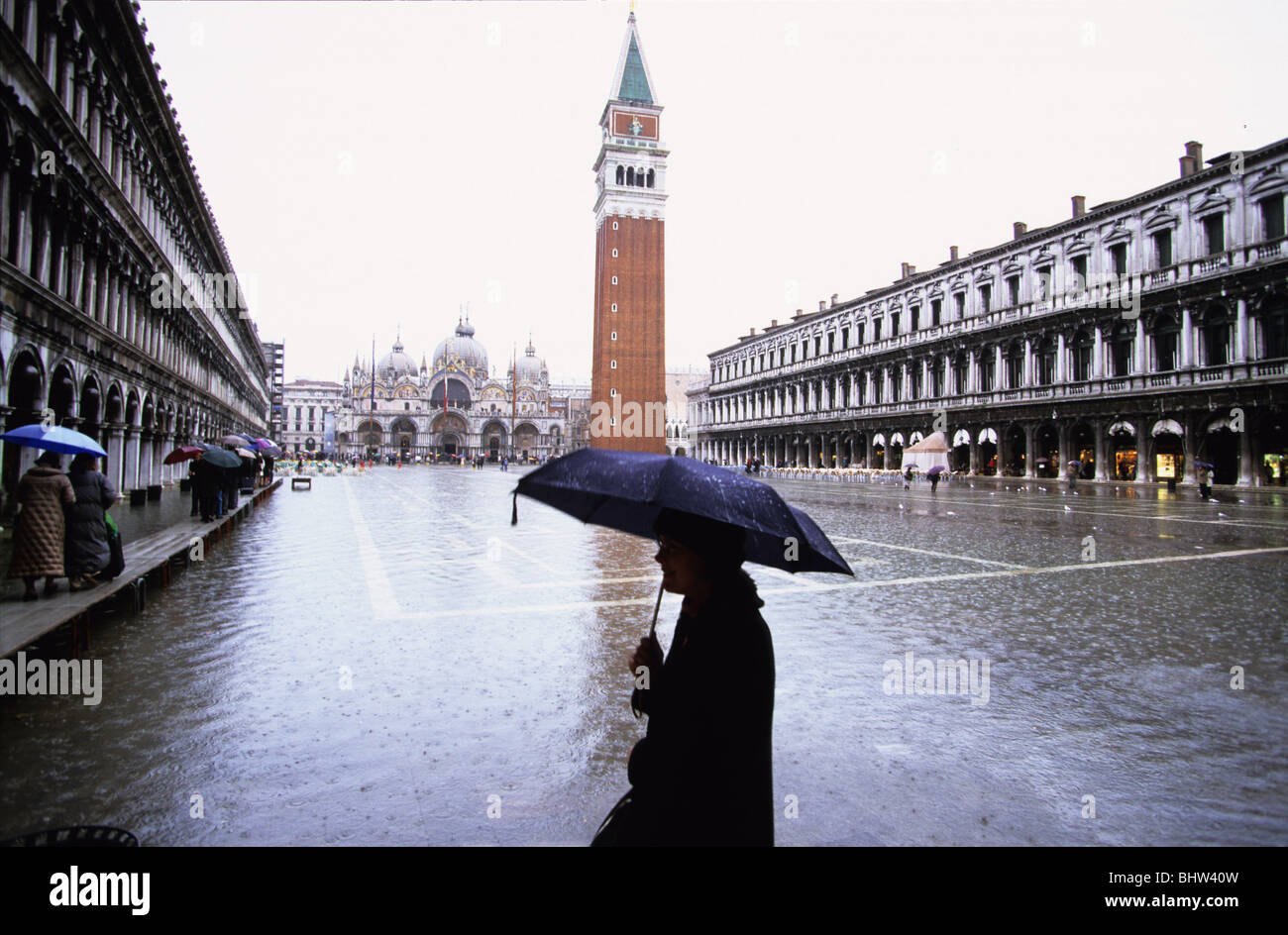 woman with an umbrella st marks square Venice Stock Photo