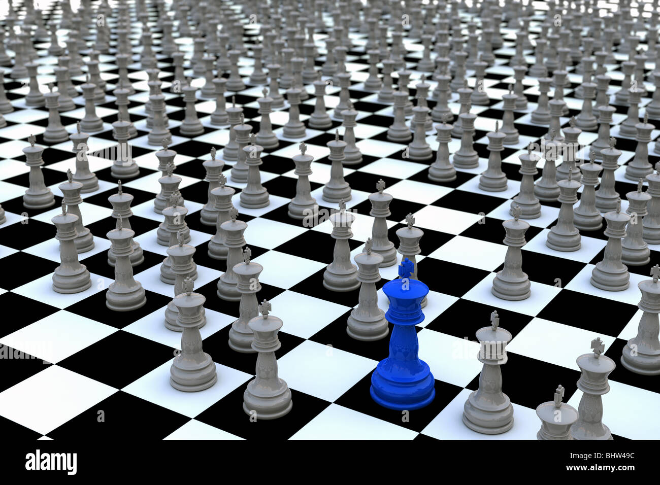 Concept for being exceptional. The King of kings. Blue chess king amongst hundreds of gray kings on a checkered surface. Stock Photo