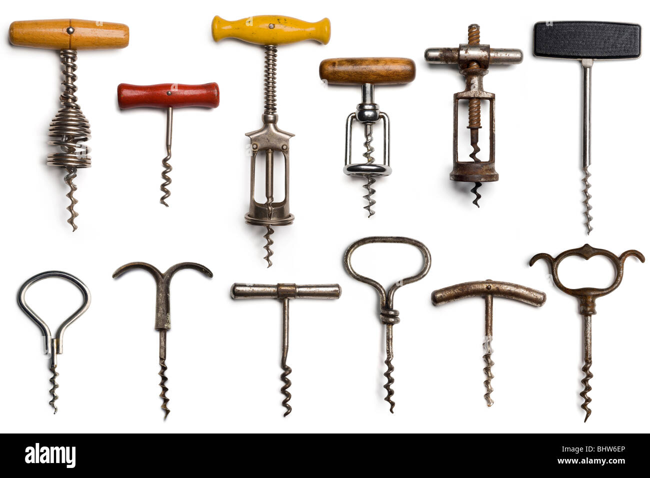 a collection of dozen vintage corkscrews on white Stock Photo
