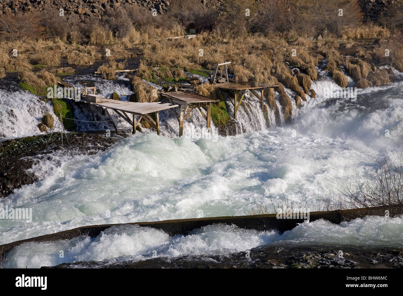 Fishing platforms used by Indians to catch salmon at Sherars Falls, on the Deschutes River, Oregon. Stock Photo