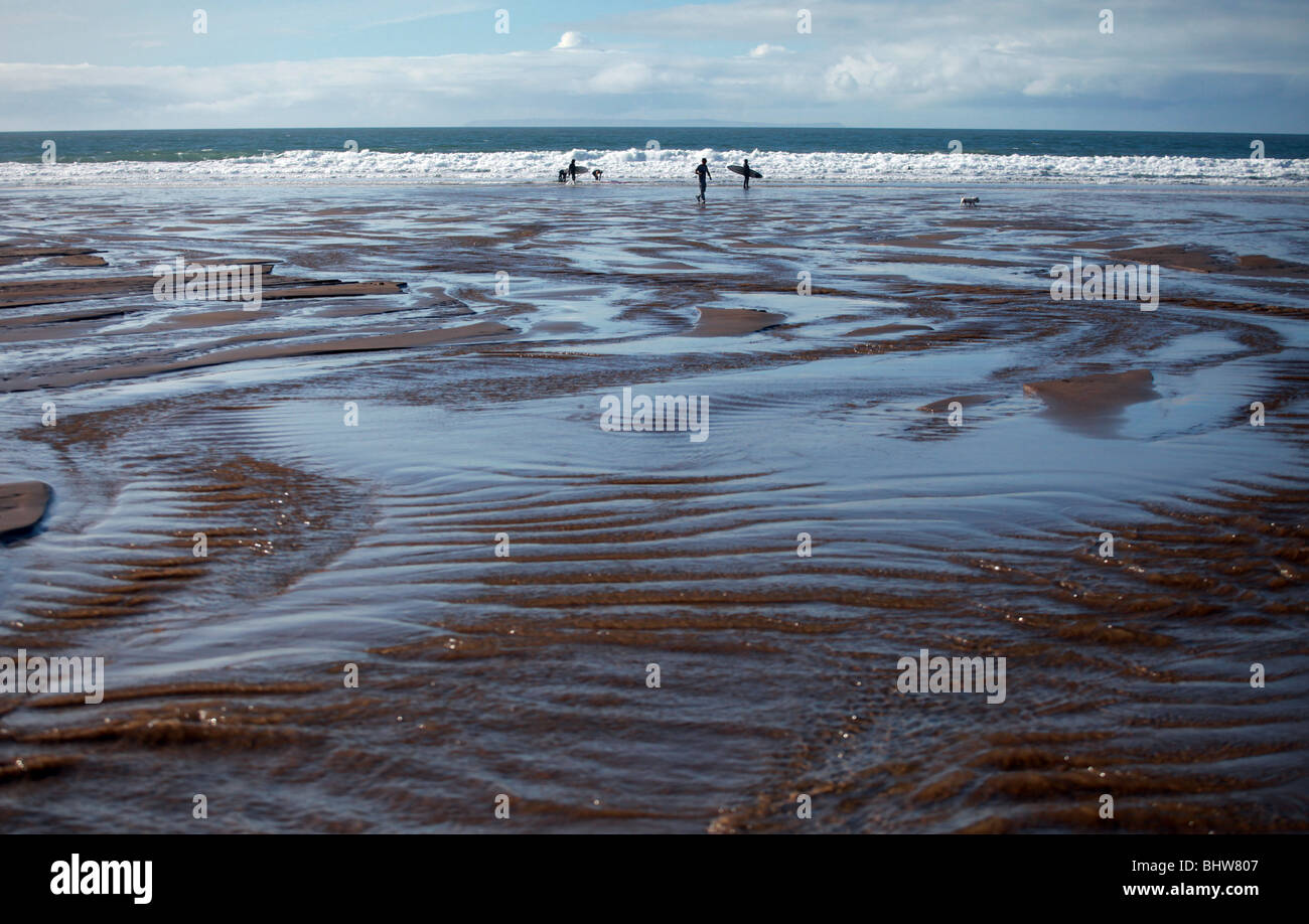 People play in the surf on Woolacombe beach, Devon. Stock Photo