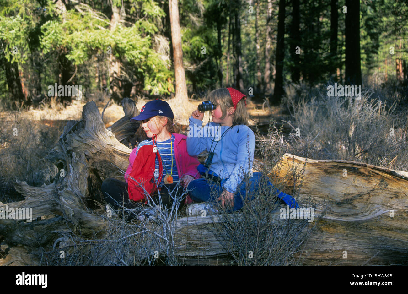 Two pre teen young campers along the Metolius River in the Cascade Mountains near Camp Sherman Stock Photo