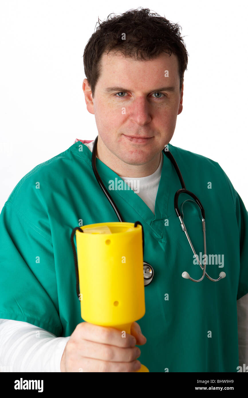 man wearing medical scrubs holding yellow charity collection box Stock Photo