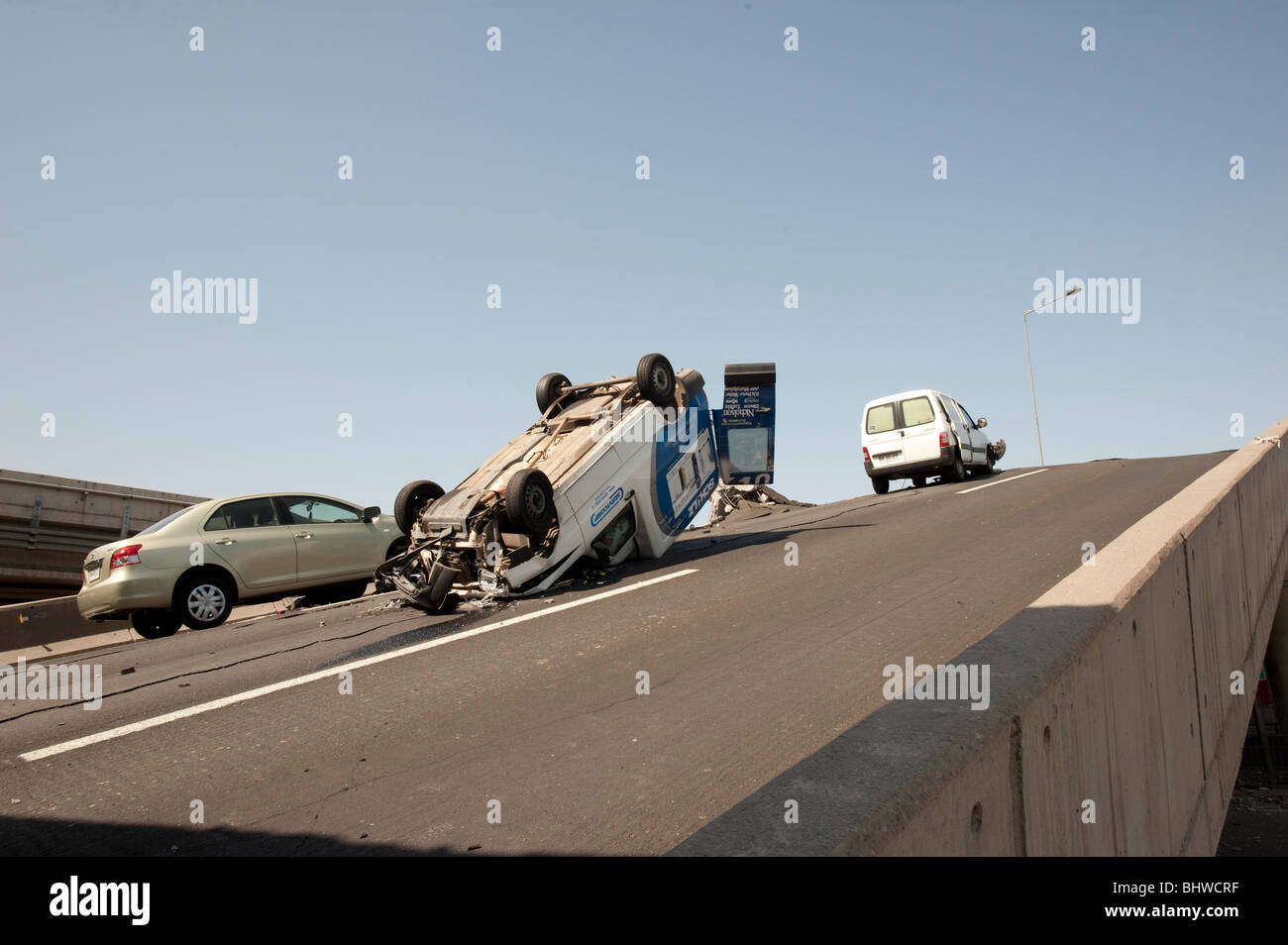 Collapsed Higway, Americo Vespucio Norte. With cars who fell in to the empty. Stock Photo