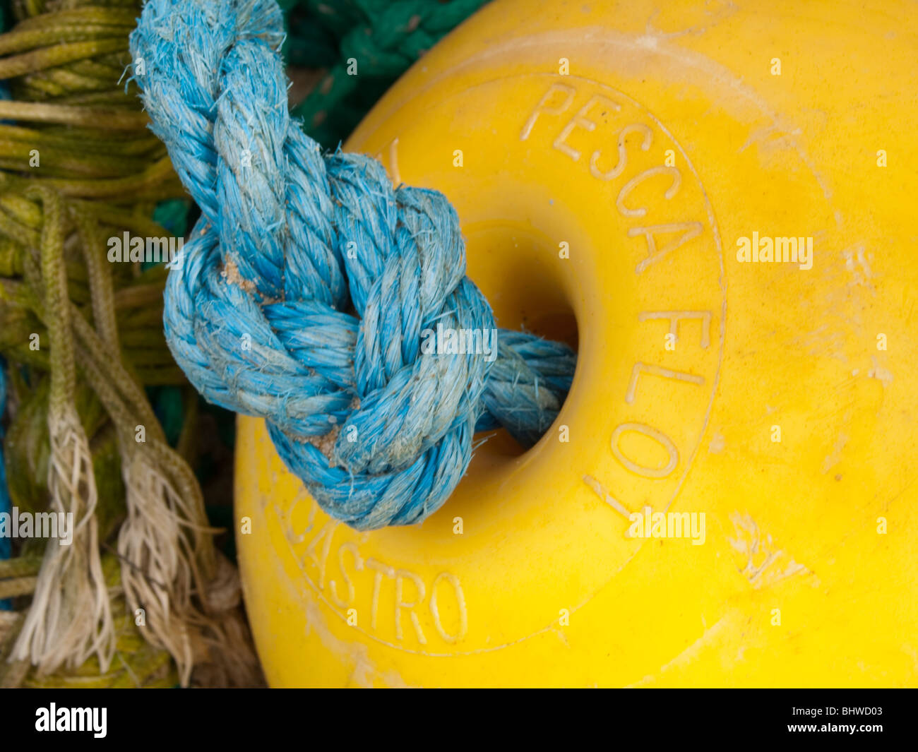Close up of large round yellow buoy on a rope at Martha's Vineyard, Massachusetts USA Stock Photo