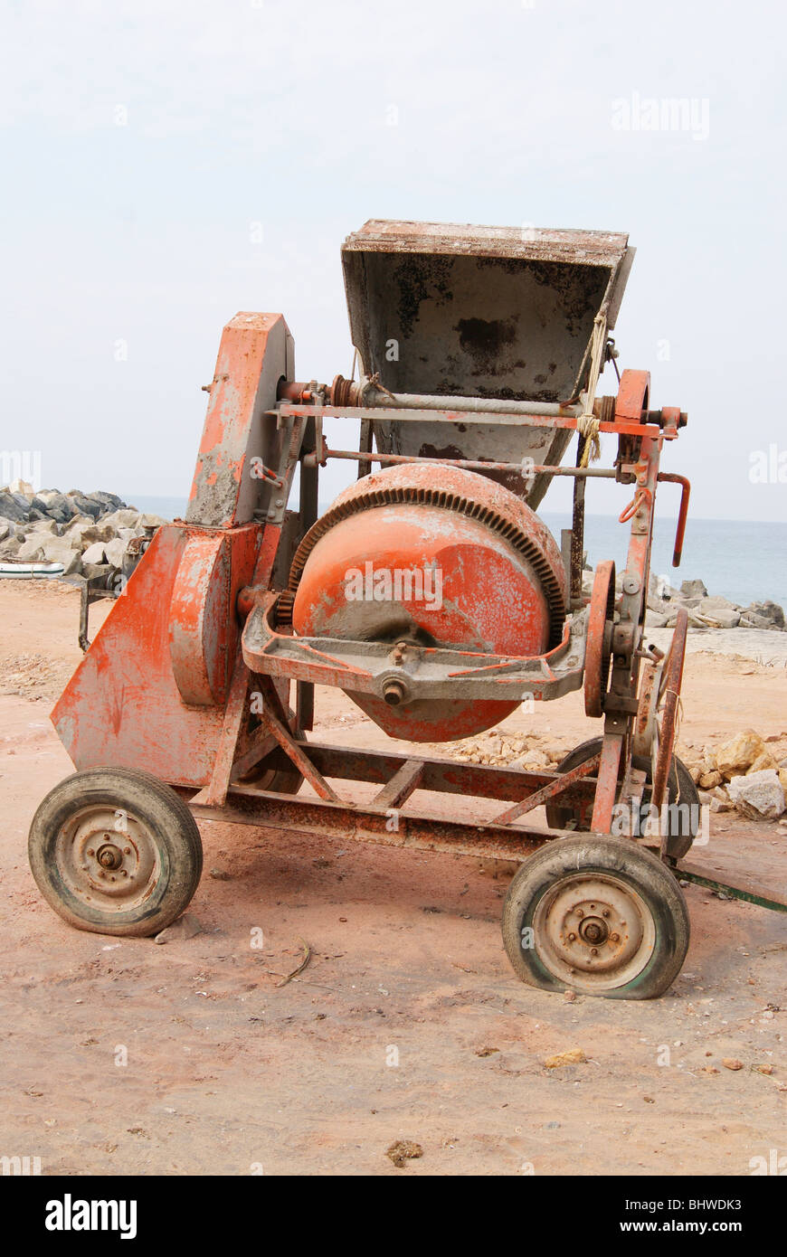Concrete Mixer staying in the coastal area as a Part of marine construction Purposes Stock Photo