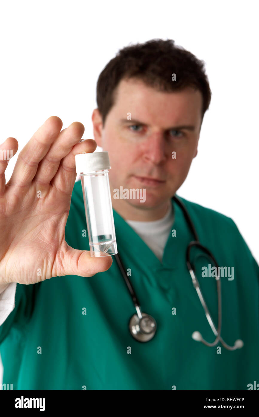 man wearing medical scrubs holding out empty specimen sample bottle Stock Photo