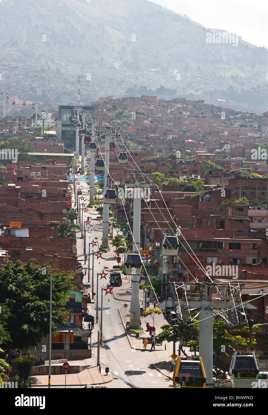 Colombia, The North side of Medellin, the metro cable extends up a hillside bringing transportation to the city's poorest Stock Photo