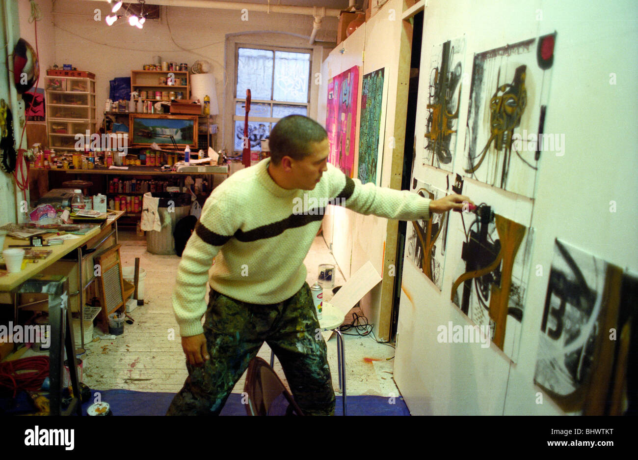 American underground graffiti artist Doze Green paints in his Brooklyn