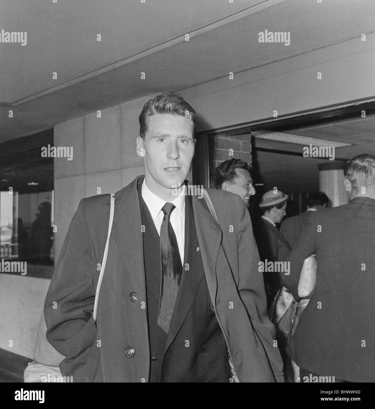 England football squad return to London airport after being knocked out World Cup tournament in Stockholm Sweden. 19th June 1958 Stock Photo