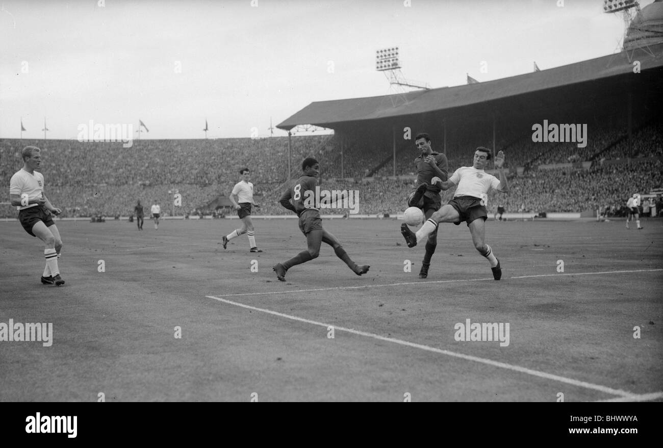 1962 World Cup Qualifying match at Wembley Stadium. England 2 v Portugal 0. England defender Jimmy Armfield blocks a shot from Stock Photo