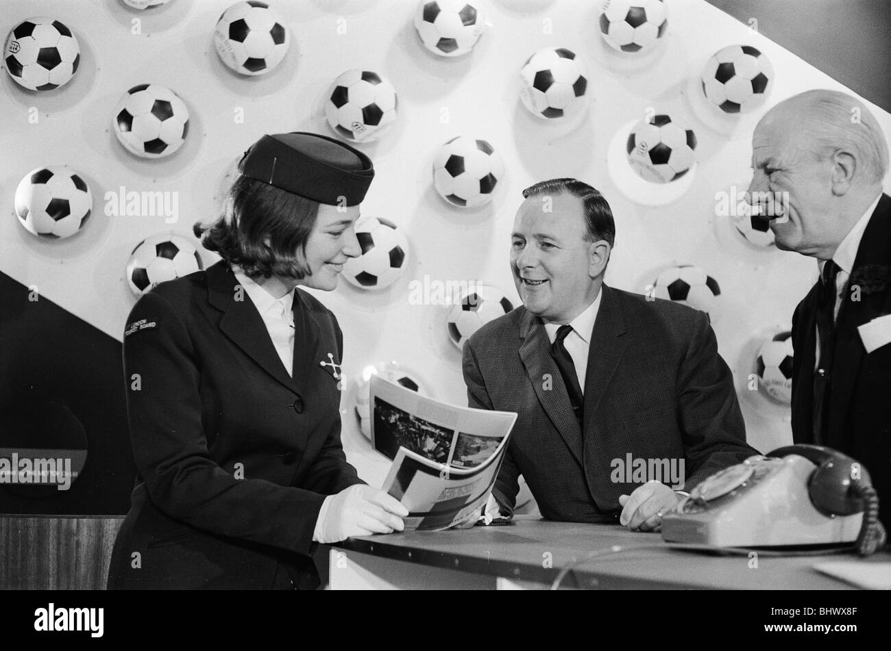 1966 World Cup Tournament in England. Minister of Sport Dennis Howell talks to Monica Law, a worker at the World Cup Information and Travel Centre, after its opening at Reed House in readiness for the tournament. 5th July 1966. Stock Photo