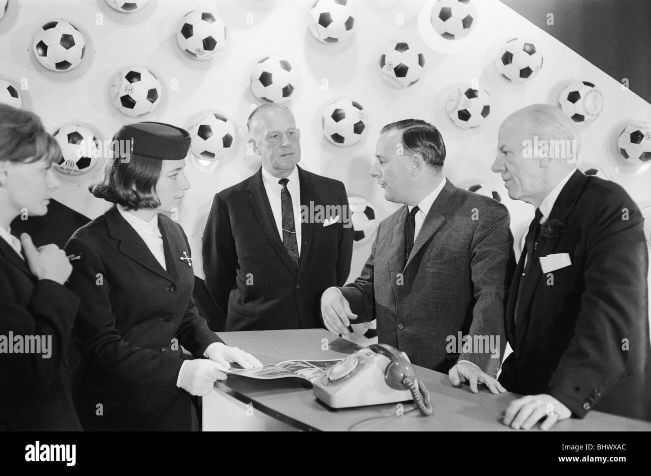1966 World Cup Tournament in England. Minister of Sport Dennis Howell talks to Monica Law, a worker at the World Cup Information and Travel Centre, after its opening at Reed House in readiness for the tournament. 5th July 1966. Stock Photo