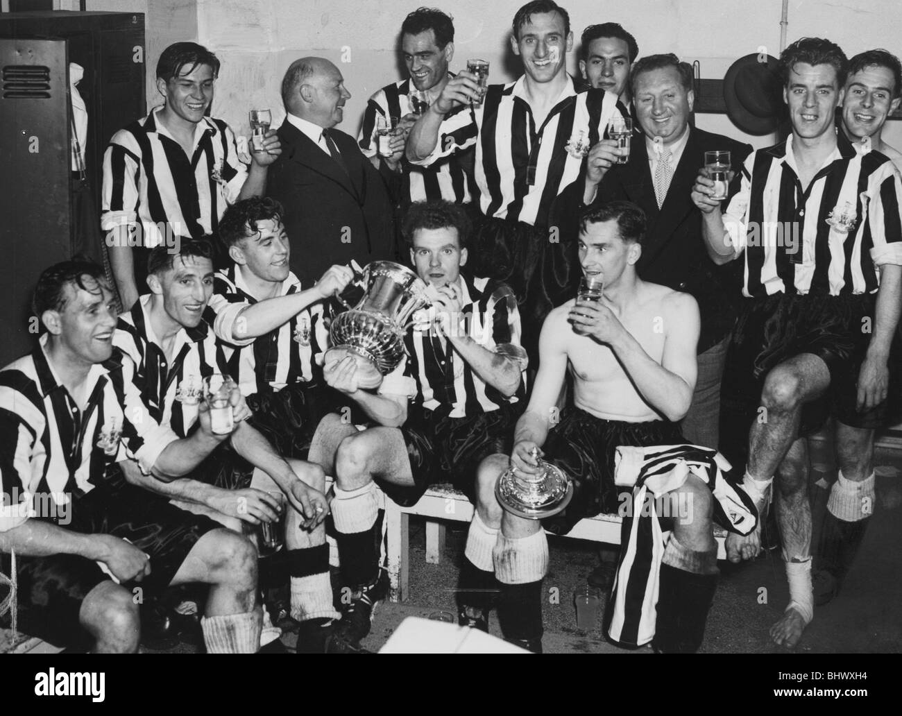 The Newcastle team in their dressing room at Wembley celebrate their one nil victory over Arsenal in the FA Cup Final. May 1952 Stock Photo