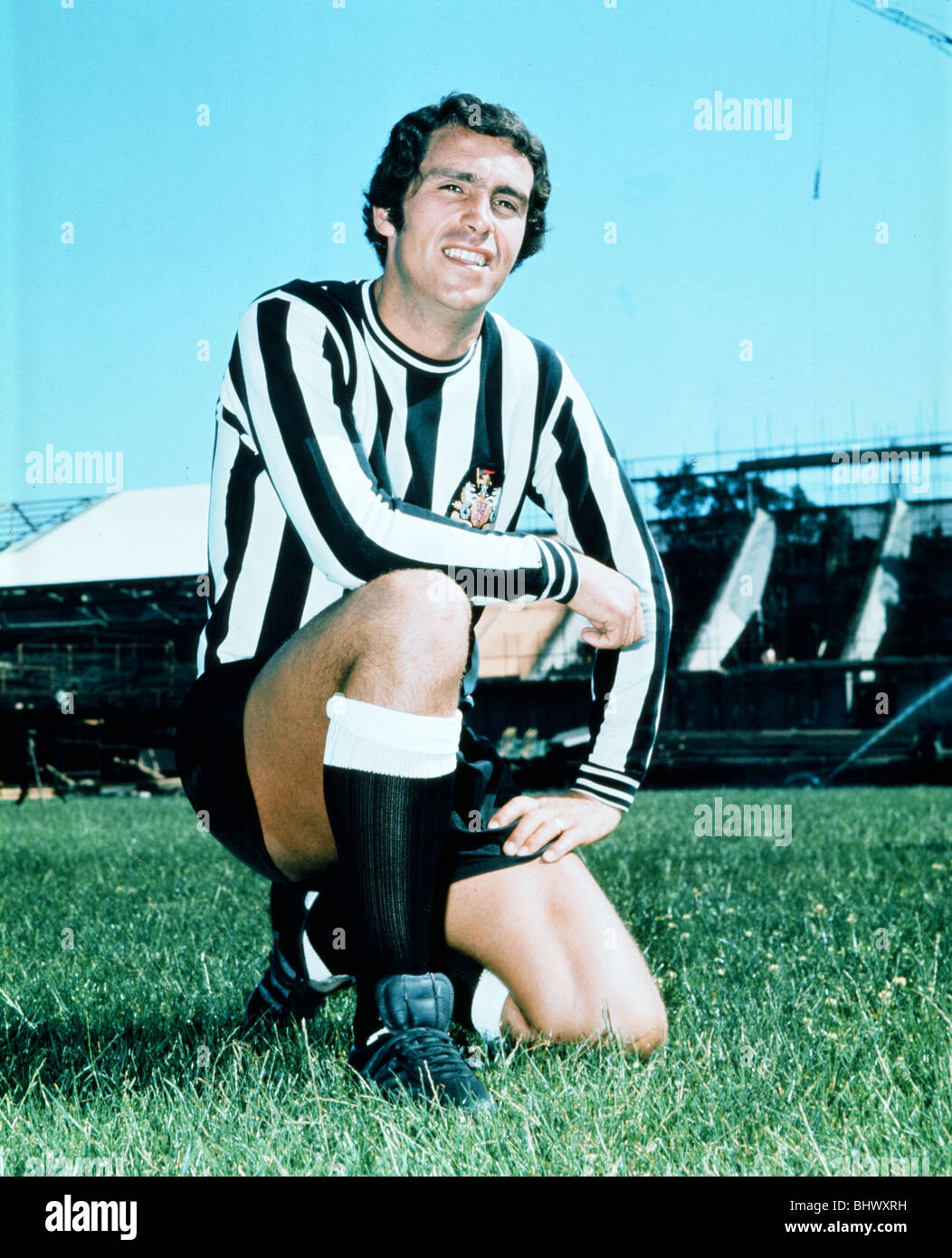 Newcastle United Bob Moncur poses on the pitch at St James as construction of the new geandstand