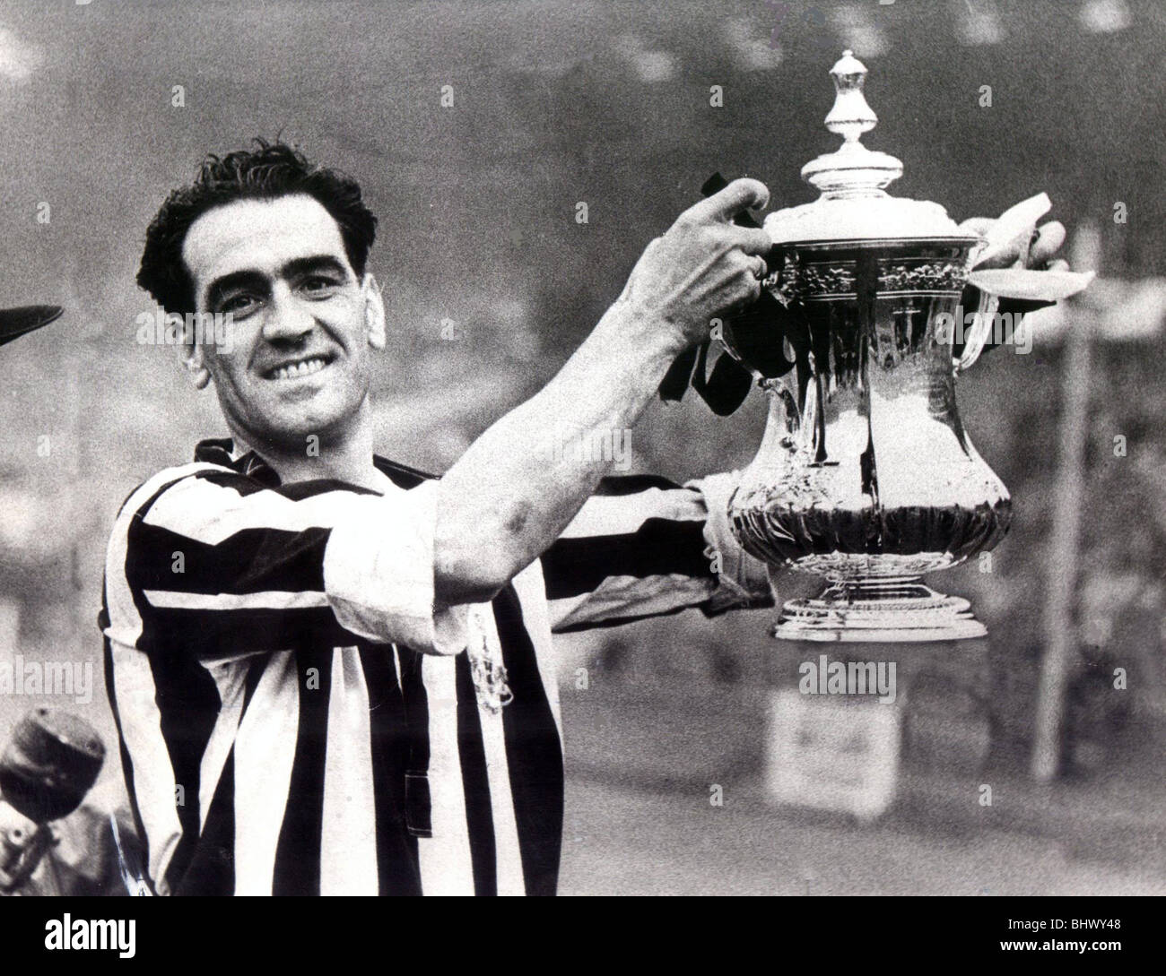 FA Cup Final 1952. Newcastle United vs Arsenal. 03/05/1952. Joe Harvey holding the FA Cup after Newcastle's victory over Arsenal. Skipper Joe Harvey shows off the trophy to the cameras after the final whistle. Little did he know that he’d be back again next year. Stock Photo